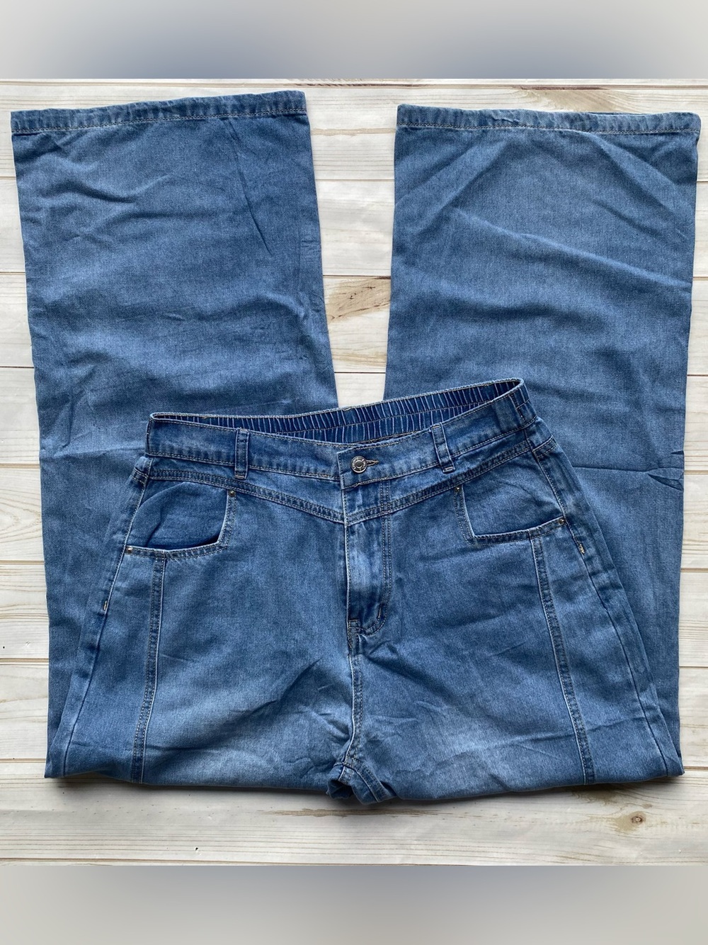Light weight medium wash wide leg flare contour stitching pull on denim jeans 12